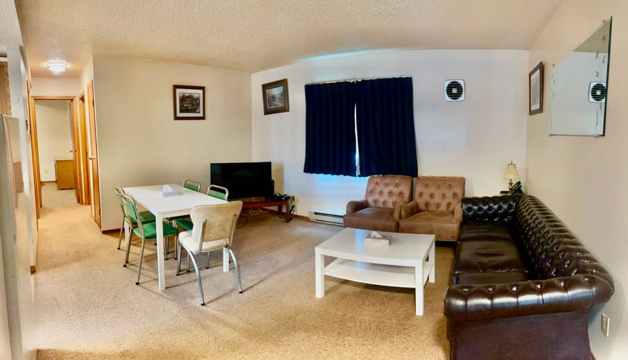 Living and dining area in a Birch Grove suite