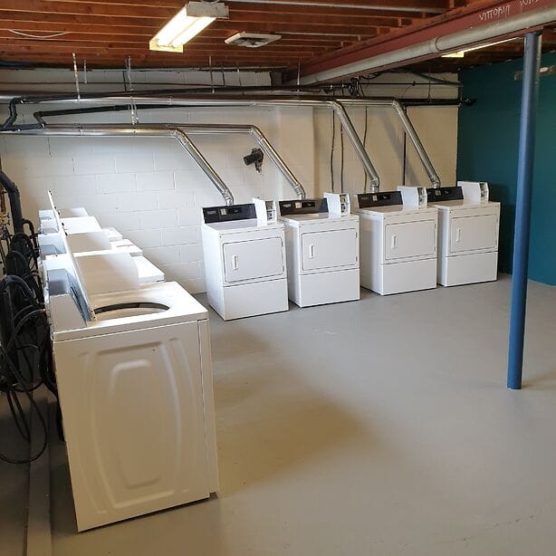Newly renovated laundromat with Maytag washers and dryers